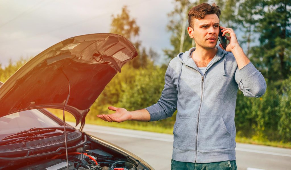 vehicle-insurance-maintenance-service-concept-breakdown-broken-car-road-photo-young-worried-man-driver-with-smart-phone-during-problem-with-car-highway